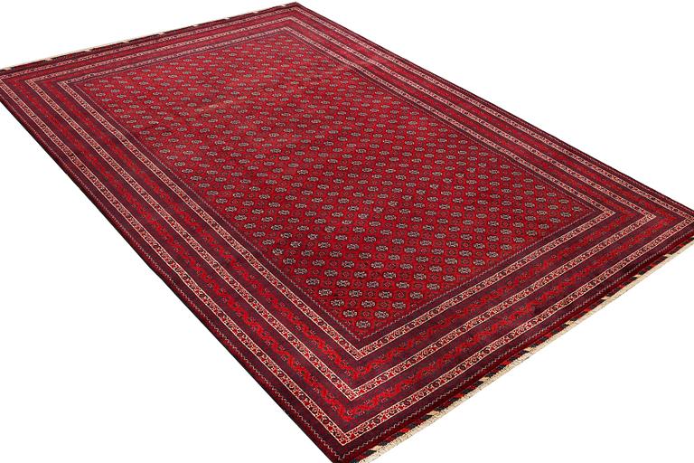 An Afghan carpet, c. 292 x 200 cm.