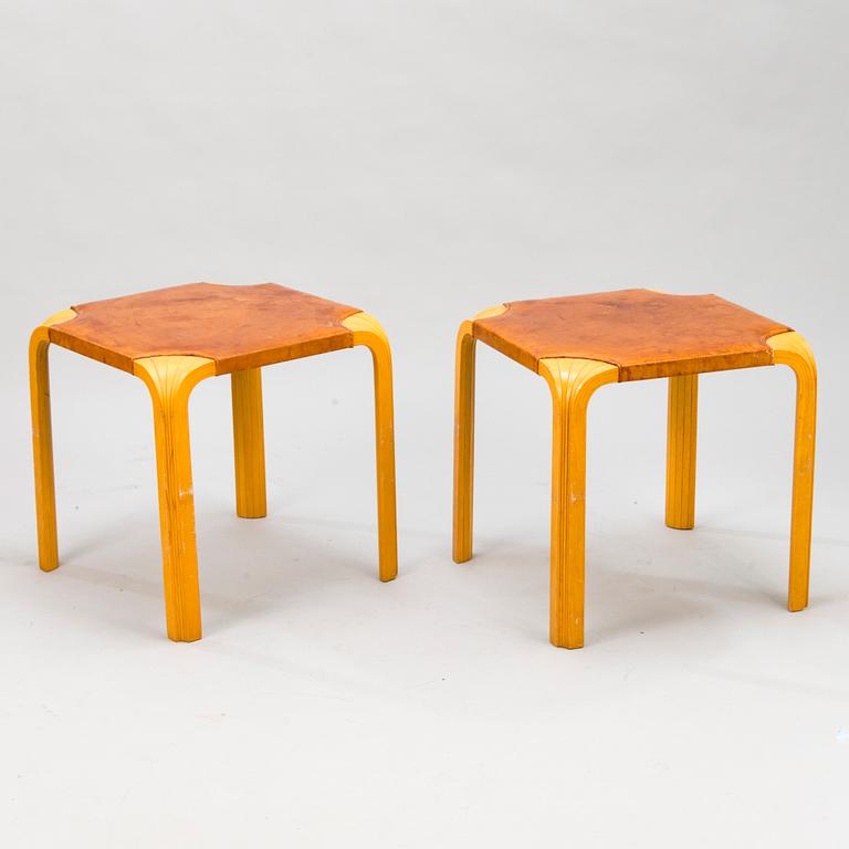 ALVAR AALTO, a pair of mid-20th century 'X602' stools for Artek.