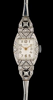 673. DAMARMBANDSUR med diamanter.