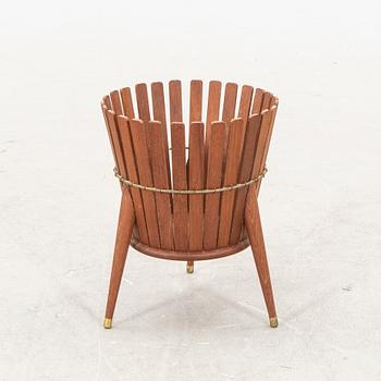 A 1950s teak wastepaper basket.