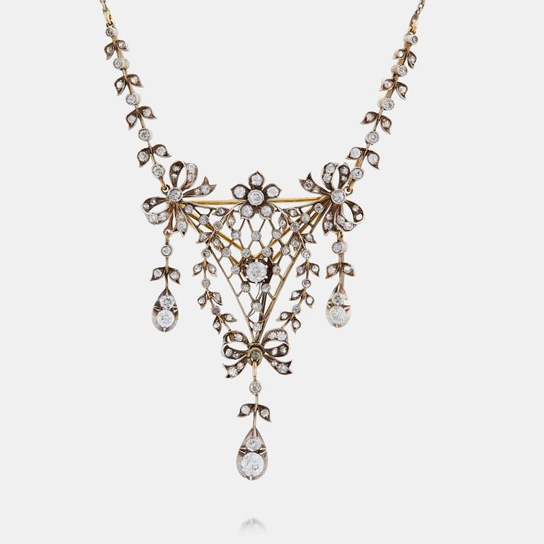 Brosch/hänge 14K guld och silver med gammal- och rosenslipade diamanter.