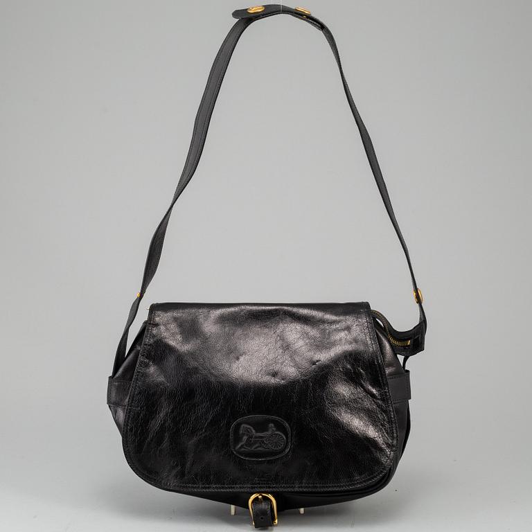 CÉLINE,a black leather handbag.