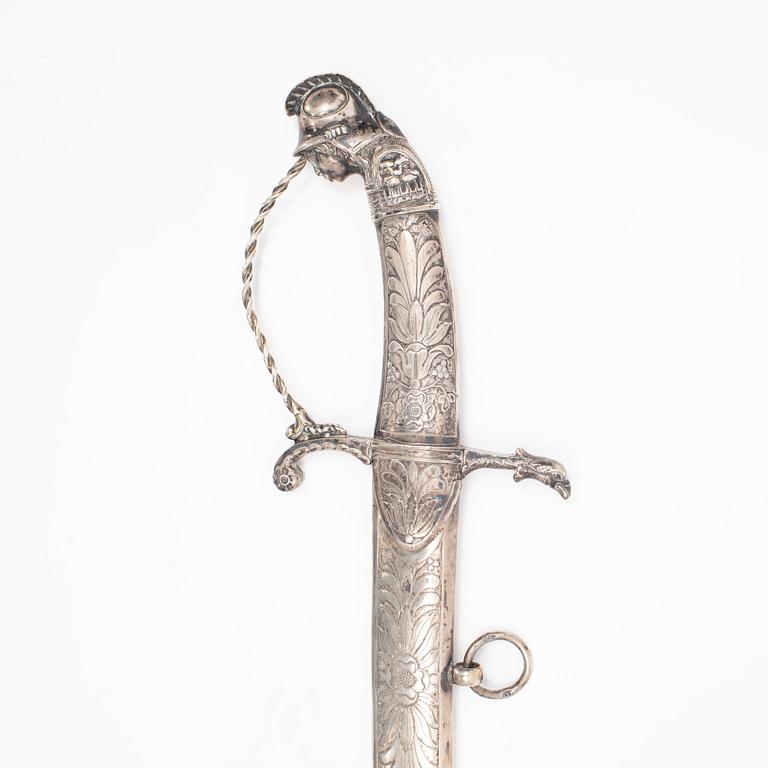 An Austro.Hungarian silver hilted sabre with silver scabbard, first part of the 19th Century.