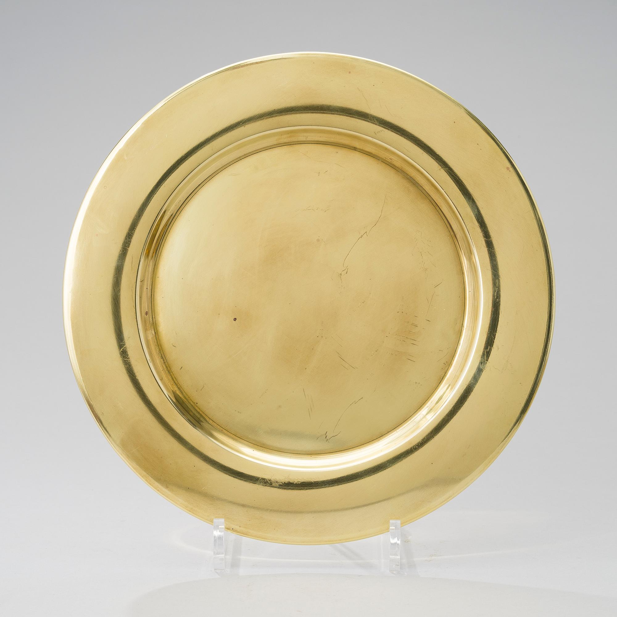 A LOT OF 11 PLATES, by Stelton, Denmark, latter half of 20th century.
