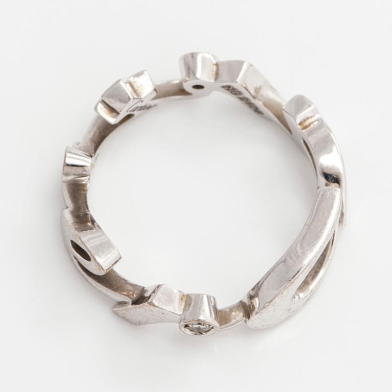 Cartier, an 18K whitegold 'Signature' ring with diamonds.