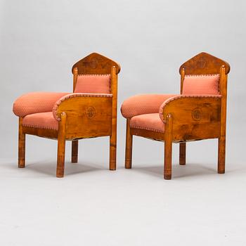 Kauno S. Kallio and Arvid Rundberg, a pair of 1902 armchairs.