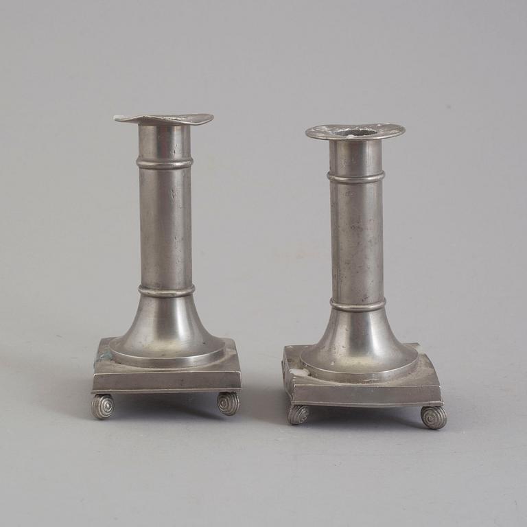 A pair of pewter candlesticks from Schreuder & Olsson Tenngjuteri, Stockholm, 1924.