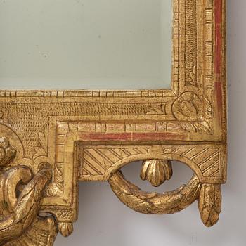 A Trasitional giltwood mirror by J. Åkerblad (master in Stockholm 1758-99).