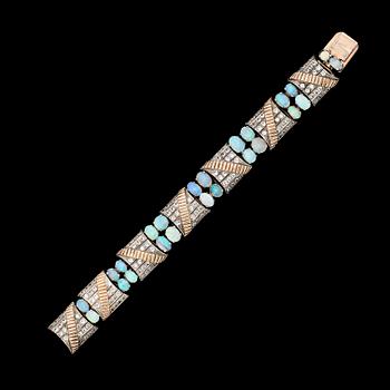 ARMBAND, 9K guld, silver, opaler och vita stenar, 1900-talets mitt. Total vikt ca 42 g.