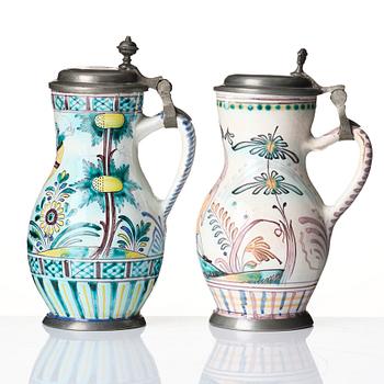 Two Dutch faience tankards with pewter lids, Delft, 18th century.
