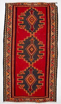 A Kilim rug, c. 300 x 165 cm.