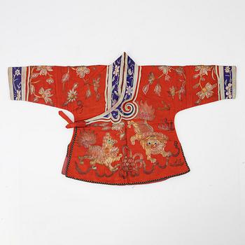 A Chinese embroidered silk jacket for children, late Qing dynasty, around 1900.