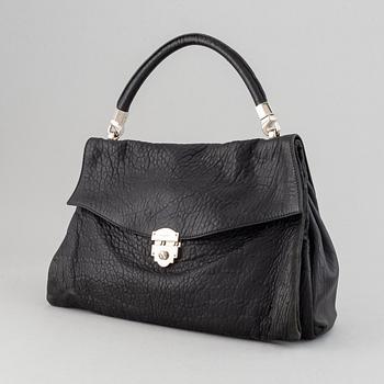 Yves Saint Laurent, a black leather bag.