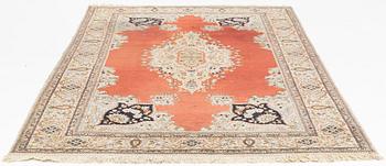 A carpet, Tabriz, ca 300 x 194 cm.