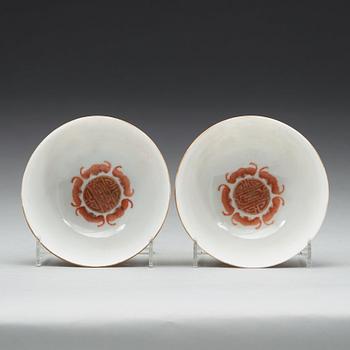 A pair of yellow ground “birthday” bowls, late Qing dynasty with Qianlong four character mark in red.