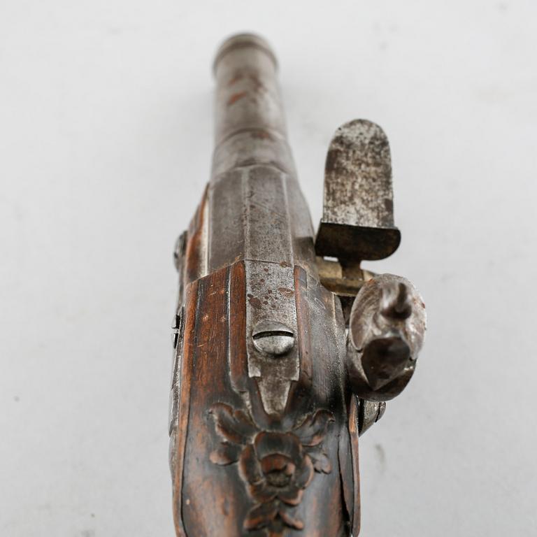 A flintlock gun, 18th century.