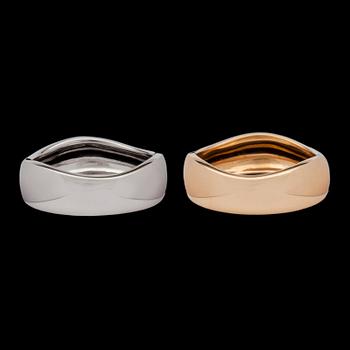 735. Two yellow- and white gold Cartier rings.