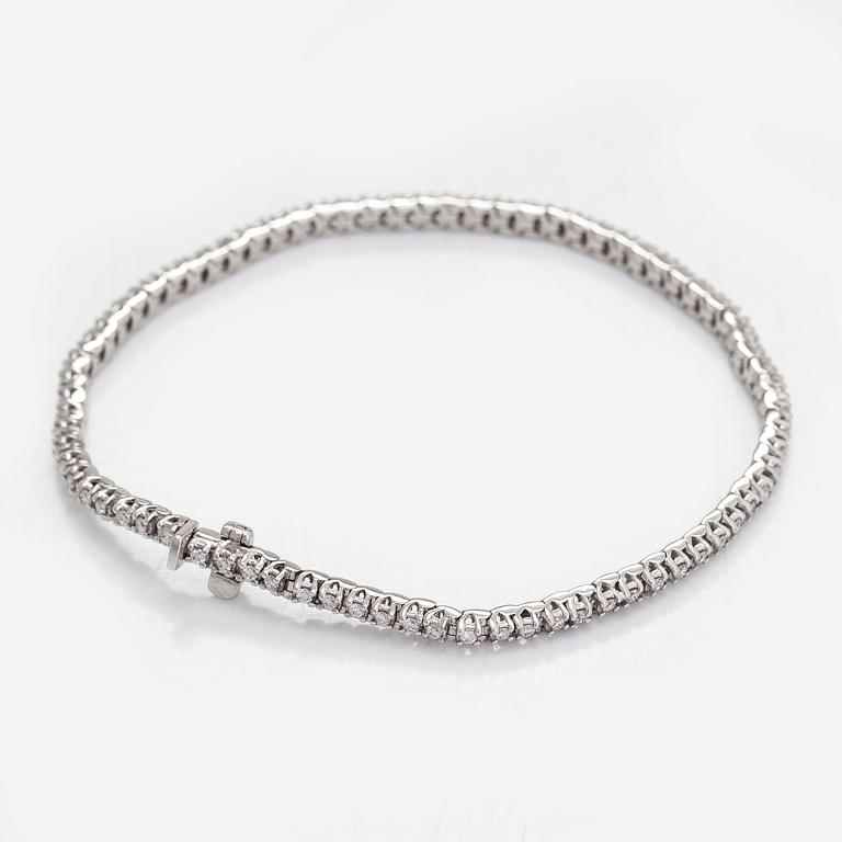 Tennisarmband, 14K vitguld med briljantslipade diamanter tot. ca 1.12 ct enligt gravyr. Finska stämplar.