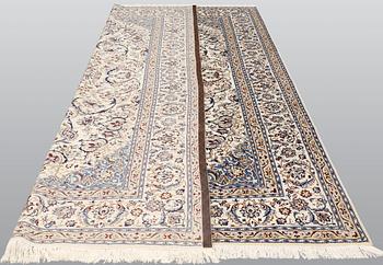 A carpet, Nain part silk so called 9LAA, ca 375 x 244 cm.