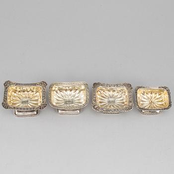 Four Russian 19th century parcel-gilt silver salt cellars, St. Petersburg and Moscow.