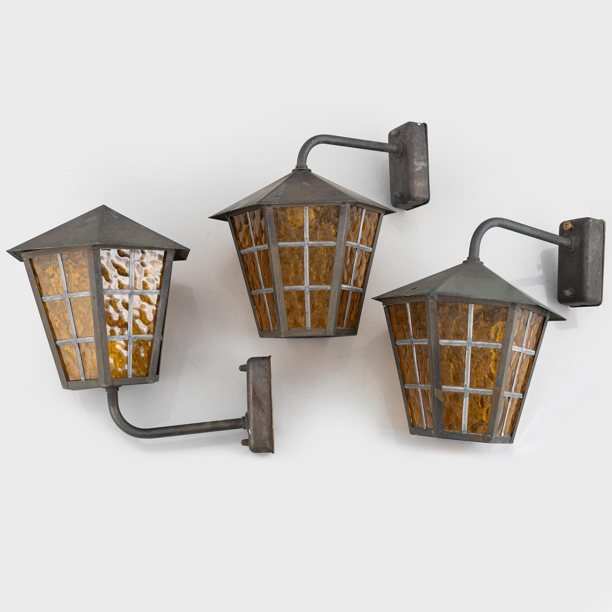 Outdoor lighting, three lamps, likely 1970s.