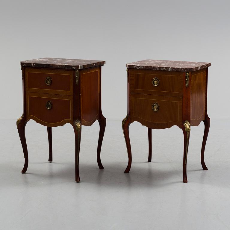 A pair of mid 20 th century mahogany bedside tables.