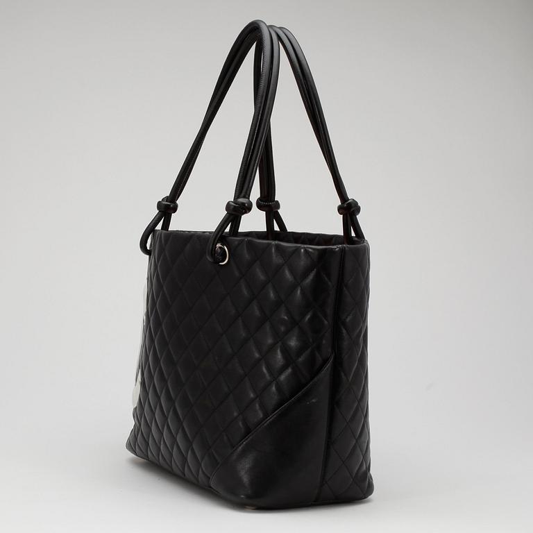 CHANEL, a black quilted leather "Shopping bag".