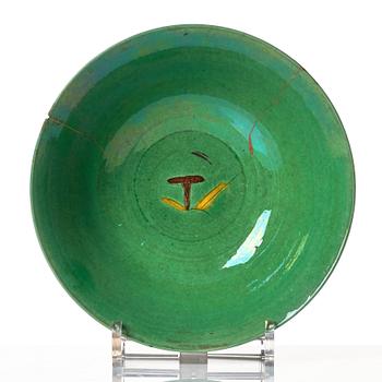 A green glazed brinjal bowl, Qing dynasty, circa 1700.