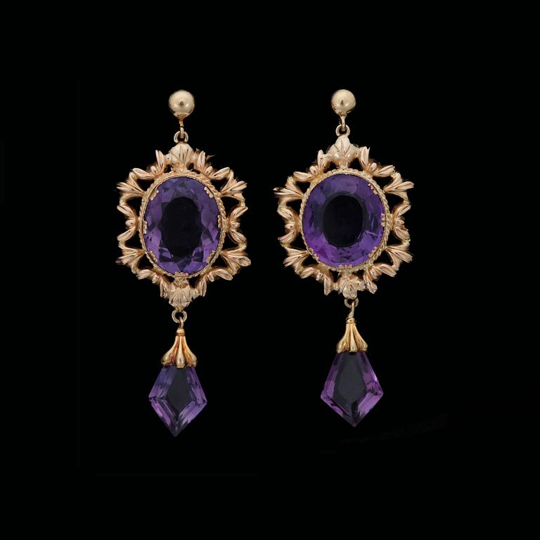 A pair of amethyst earrings.