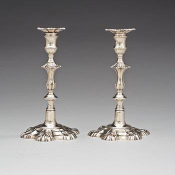 A pair of English mid 18th century silver candlesticks, marks of John Cafe, London 1753.