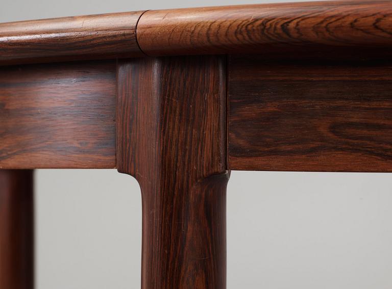 A Niels Ole Møller palisander dining table and nine chairs, J.L. Møller, Denmark 1950's-60's.