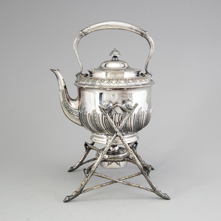 A 20th century tea pot on stand by Walker & Hall, Sheffield, England.