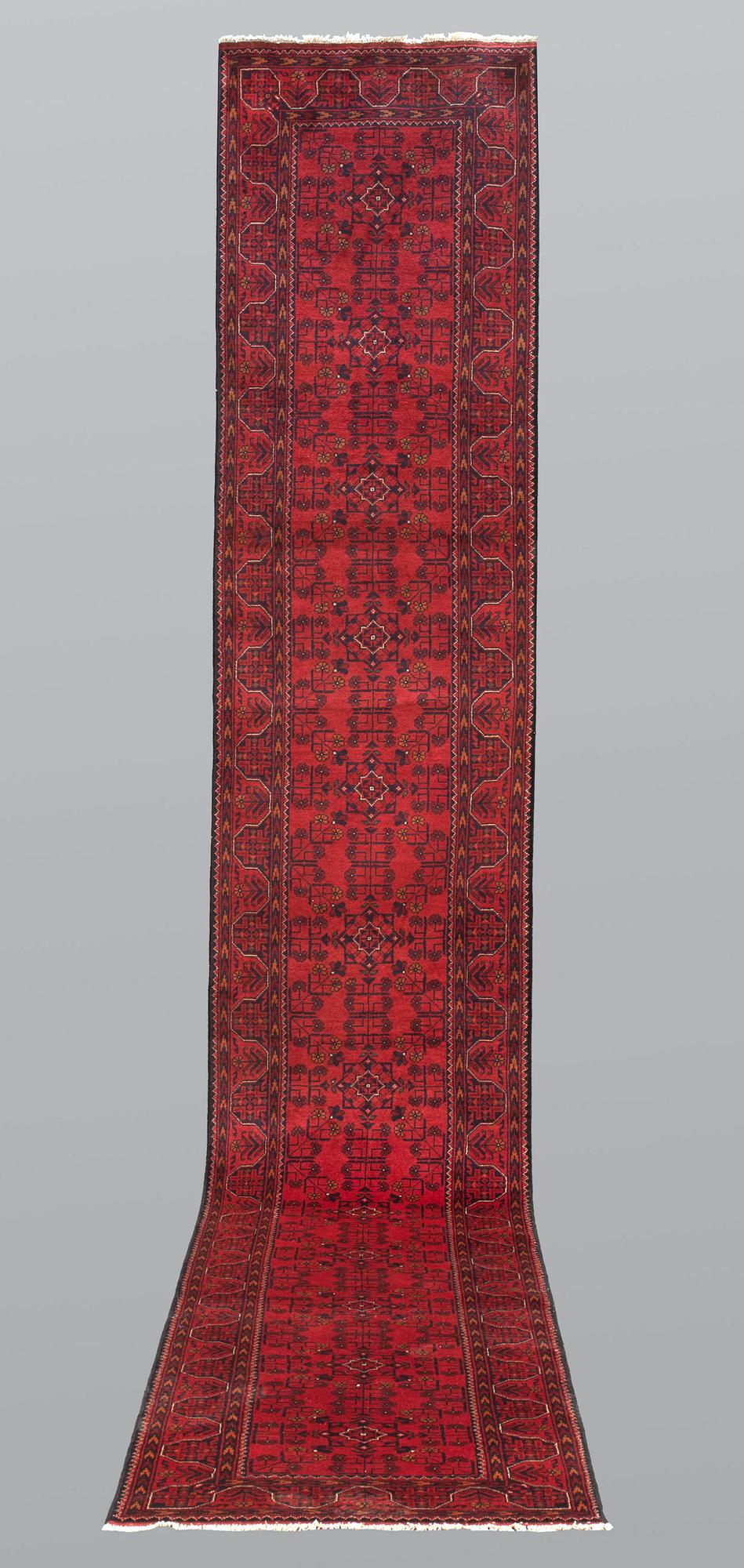 A runner, Afghan s.k khan mohammadi, ca 486 x 79 cm.