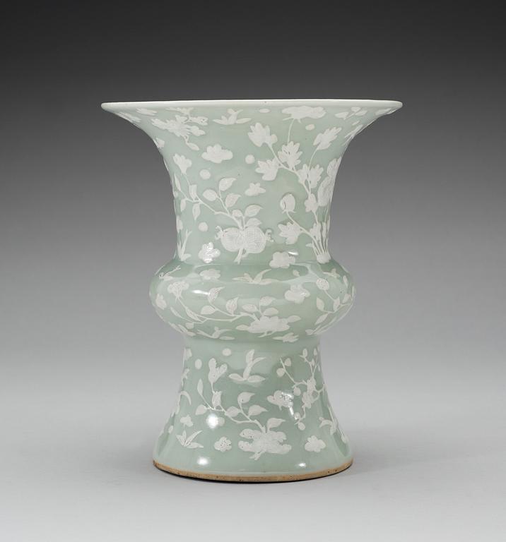 A celadon slip decorated vase, Qing dynasty, Kangxi (1662-1722).