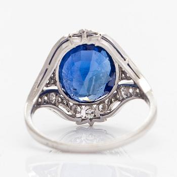 A. Tillander, a platinum ring, set with a cushion-cut sapphire and brilliant- and octagonal-cut diamonds.