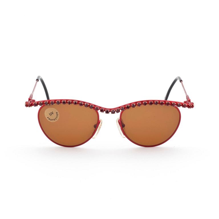 MOSCHINO, ett par solglasögon.