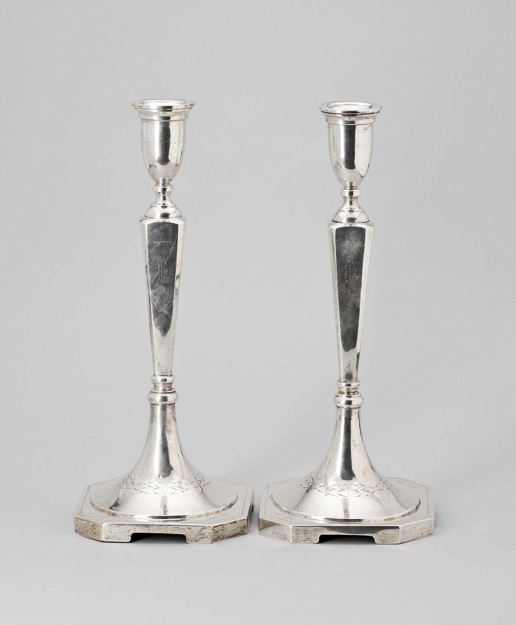 LJUSSTAKAR ett par, silver, trol Polen, 1900-talets början. Vikt ca 880 g.