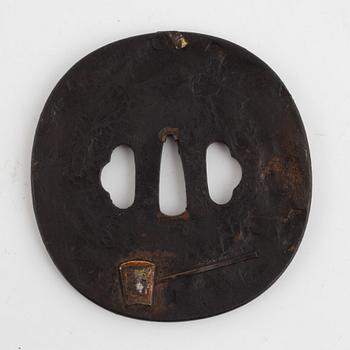A Japanese gilt-bronze fan-shaped box and gilt iron tsuba with mei inscription, Meiji period (1868-1912).