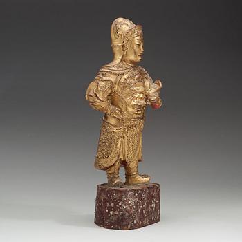 A wood sculpture of a guardian figure, (1644-1912).