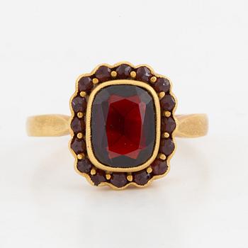 A garnet ring.