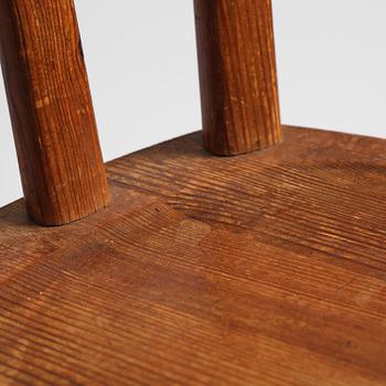 Axel Einar Hjorth, a set of three stained pine "Utö" chairs, Nordiska Kompaniet, Sweden, 1930s.