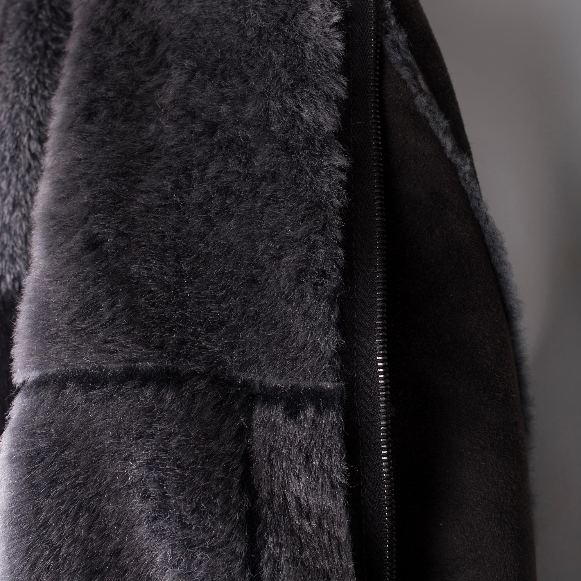 A Chanel Identification sheepskin jacket, French size 40.