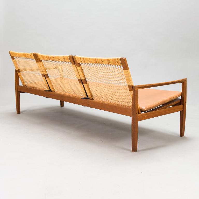 Hans Olsen, A teak and rattan sofa for Juul Kristensen, Denmark, late 1950s.