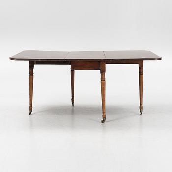 A mahogany dining table, second half of the 19th Century.