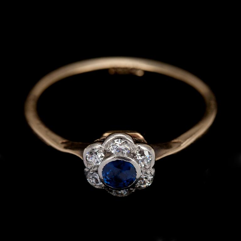 RING, guld 18K, safir, 6 små diamanter. Vikt 2 g.