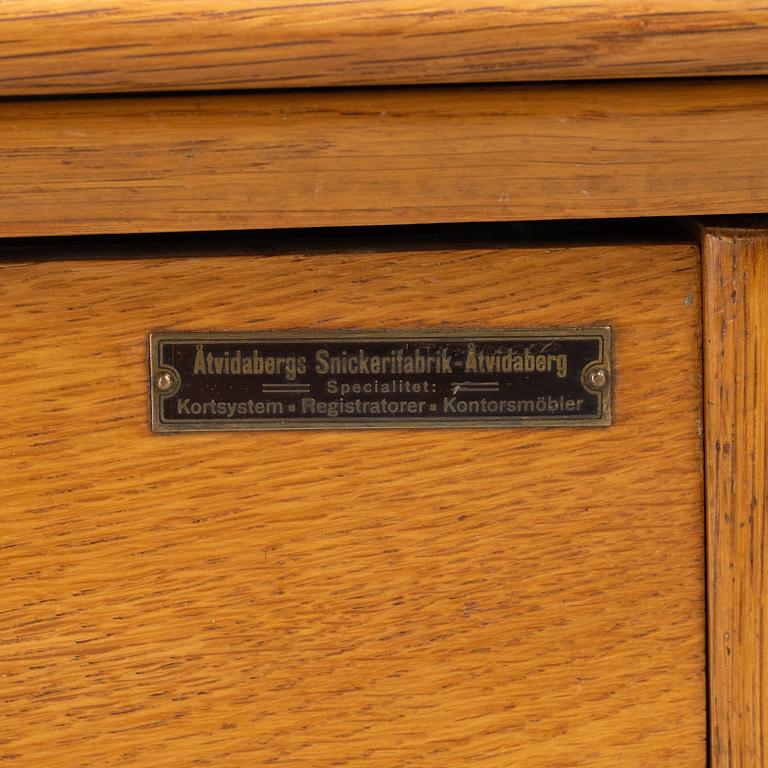 An oak writngdesk with a chair from Åtvidabergs, first part of the 20th century.