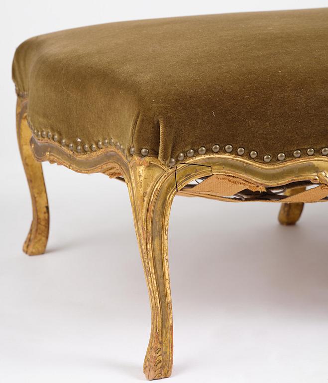 A French Louis Xv giltwood lit de repos, later part 18th century.