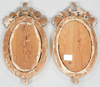 A PAIR OF SWEDISH EMPIRE TWO-LIGHT MIRROR GIRANDOLES, SIGNED JOHAN MARTIN BERG.