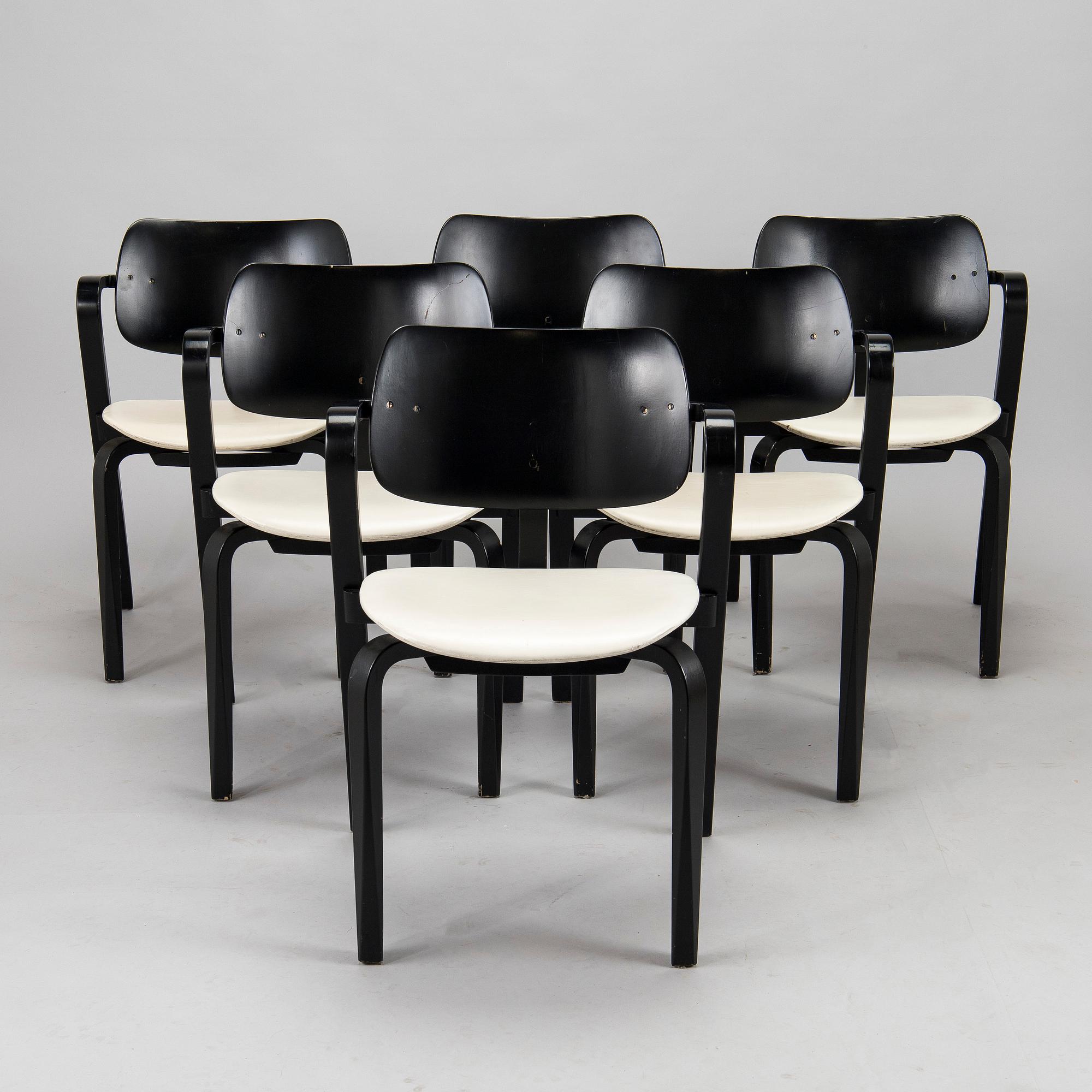 Ilmari Tapiovaara, a set of six 1960s 'Aslak' armchairs for Asko, Finland.