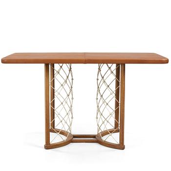 A modernist oak based table, 1940-50's.